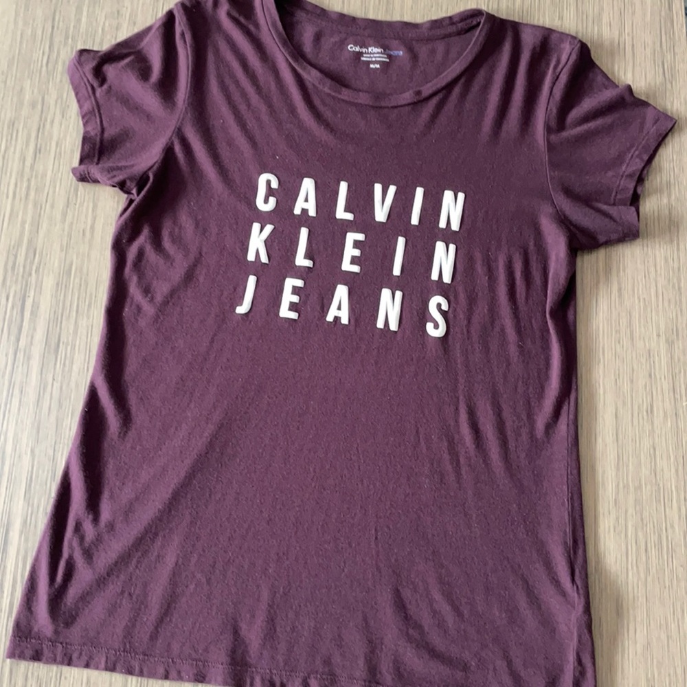 Cotton tee size medium in color purple